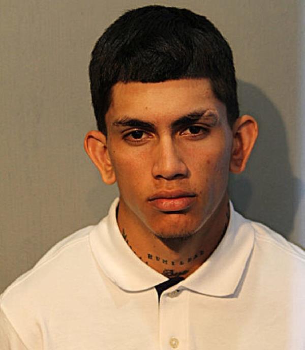 Jean Torres-Roman's mugshot, which was taken after his arrest in Chicago