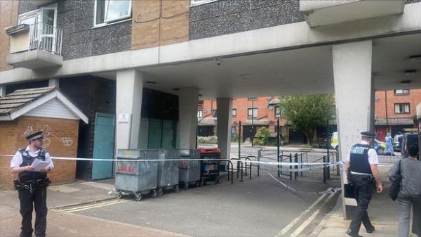 Police officers are guarding the cordon at Scotts Road