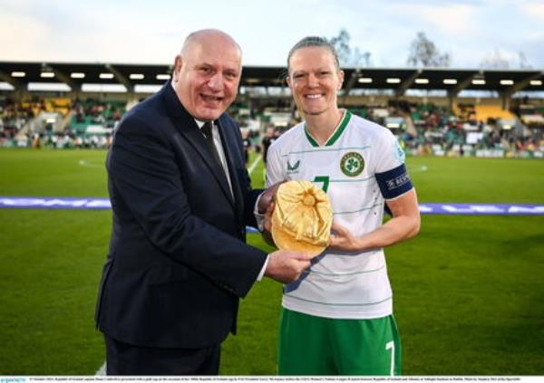 Republic of Ireland captain Diane Caldwell is presented with a gold cap on the occasion of her 100th Republic of Ireland cap by FAI President Gerry McAnaney. Photo by Stephen McCarthy/Sportsfile Republic of Ireland captain Diane Caldwell is presented with a gold cap on the occasion of her 100th Republic of Ireland cap by FAI President Gerry McAnaney. Photo by Stephen McCarthy/Sportsfile